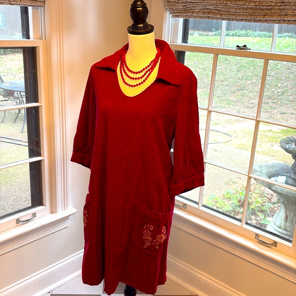 April Cornell red corduroy tunic dress with embroidered pocket details.